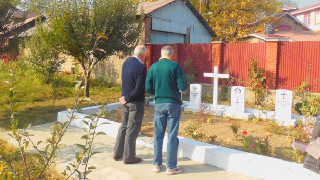 Doug and James Dykes at the graveside
