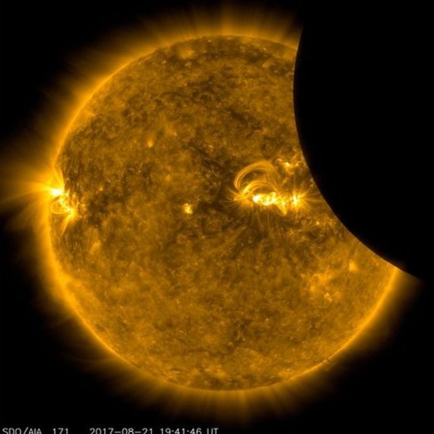 Image of the Moon transiting across the Sun, taken by SDO in 171 angstrom extreme ultraviolet light on Aug. 21, 2017.