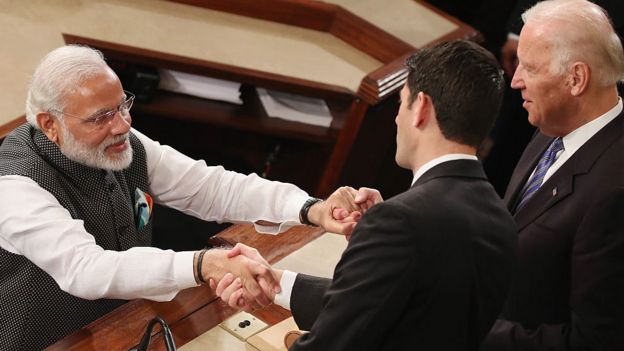 Indian Prime Minister Narendra Modi, (L), shakes hands with House Speaker Paul Ryan (R-WI), (C), and US Vice President Joseph Biden (