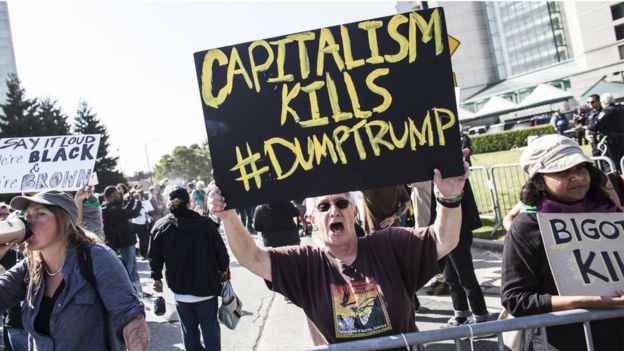 Protesters block traffic outside of the California Republican Party Convention