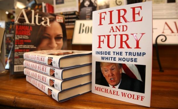 Copies of the book "Fire and Fury" by author Michael Wolff on display in a book shop