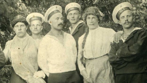 Russian sailors with young men dressed in women's clothes, 1916