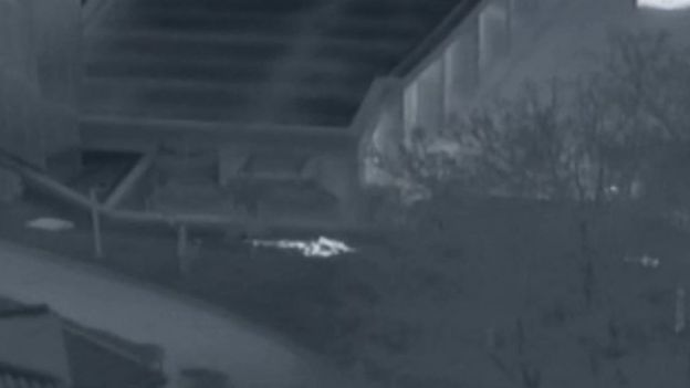 Screengrab of video clips showing North Korean soldier defecting to the South at the JSA