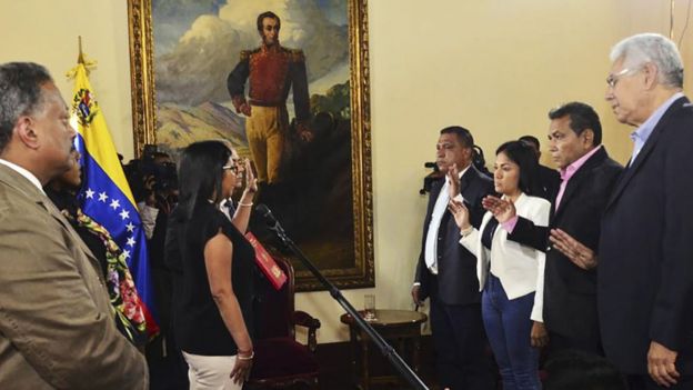 Venezuelan Constituent Assembly President Delcy Rodriguez (left) swears in four opposition governors in Caracas, 23 October 2017