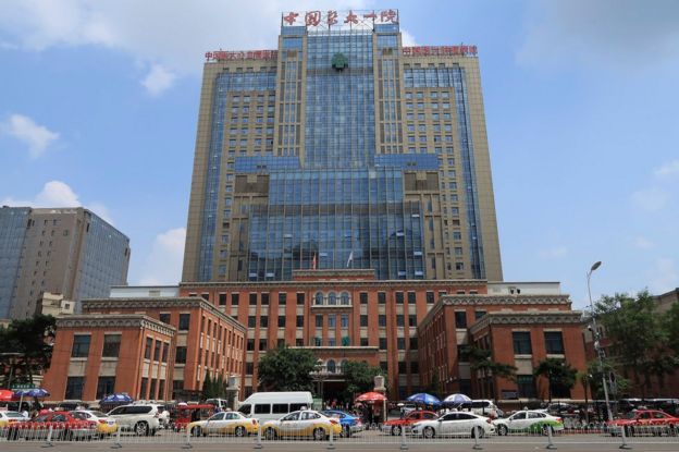 Vehicles pass in front of building number 1 of the First Hospital of China Medical University in Shenyang where friends of sick dissident Liu Xiaobo say he is being treated, in Shenyang, China 10 July 2017.