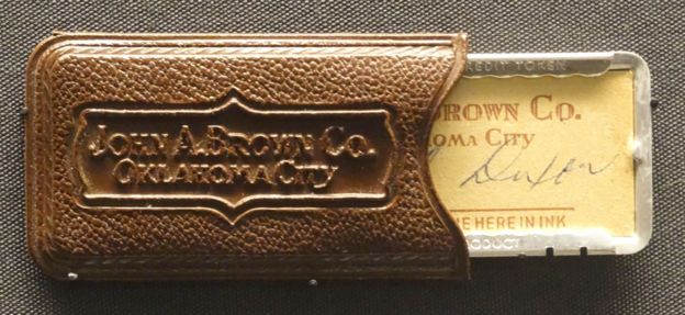 A John A. Brown Company "charga-plate" and case from Oklahoma City in the 1950s