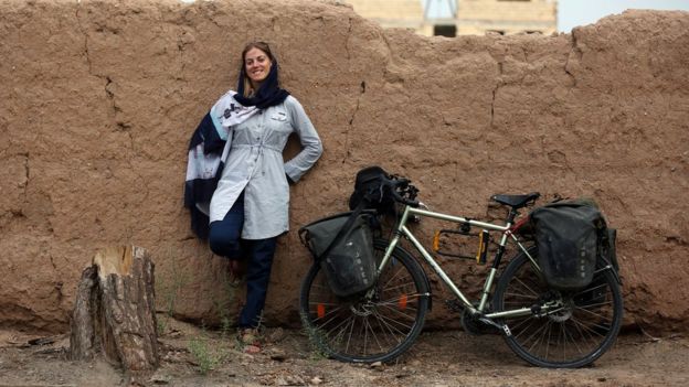 Rebecca Lowe with her bicycle in Iran