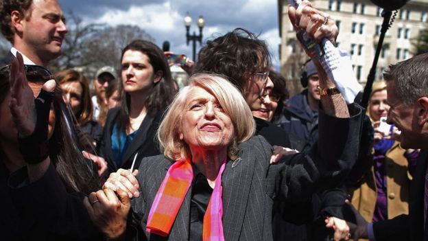 Edith Windsor is mobbed by journalists and supporters as she leaves the Supreme Court in Washington DC, 27 March 2013