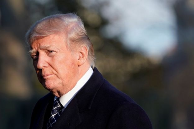 US President Donald Trump walks on the South Lawn of the White House upon his return to Washington, US, after spending the weekend in Mar-a-Lago estate in Palm Beach, Florida, 25 March 2018