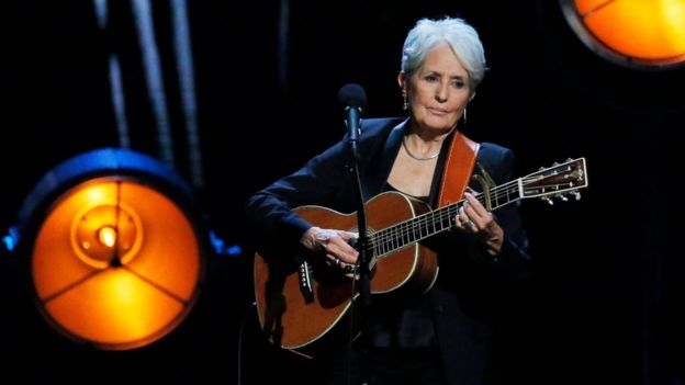 Joan Baez performs on stage