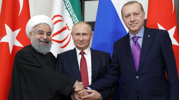 الرئيس التركي رجب أردوغان والرئيس الروسي فلاديمير بوتين و الرئيس الإيراني حسن روحاني