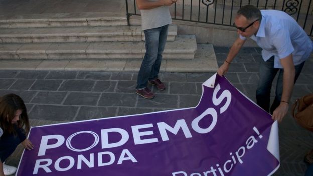 Una pancarta de Unidos Podemos