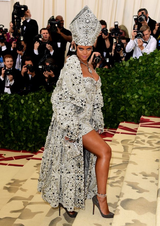 Rihanna wears a papal-inspired gown in honour of this year's theme.