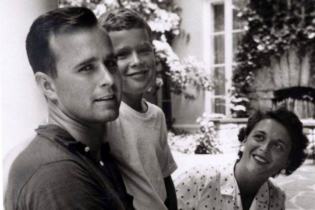 George W. Bush is shown with his father, future President George Bush and mother, future first lady Barbara Bush in Rye, New York, in this file photo taken during the summer of 1955.