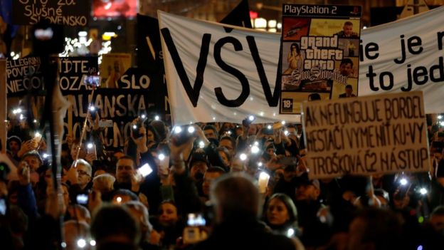 People take part in a rally near the Slovak National Uprising square against corruption and to pay tribute to murdered Slovak journalist Jan Kuciak under the slogan "For a Decent Slovakia", on March 16, 2018 in Bratislava, Slovakia