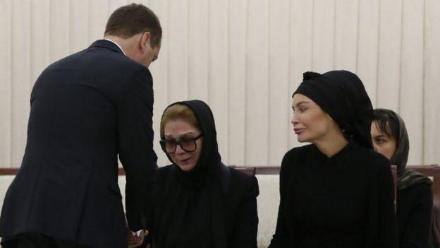 Russian PM Dmitry Medvedev consoles Tatyana Karimova and Lola Karimova-Tillyaeva