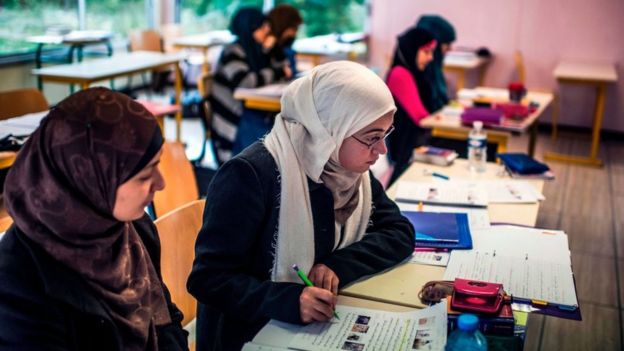 While the hijab is banned in some public buildings in France, students can wear them at universities