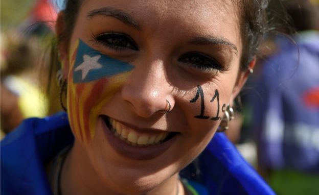 Woman with Catalan flag painted on her face, 11 Sep 17