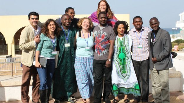 A group of young people of different culture standing together