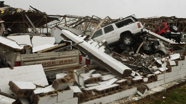 Destroyed vehicles and buildings at Rockport Airport