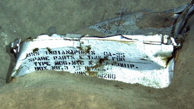 A steel part showing the the text: USS Indianapolis, spare parts