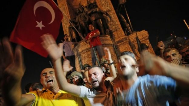 Erdogan supporters protest in front of soldiers on Istanbul's Taksim Square. Photo: 16 July 2016