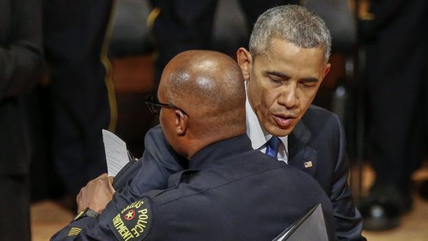 Barack Obama hugs Police Chief David Brown