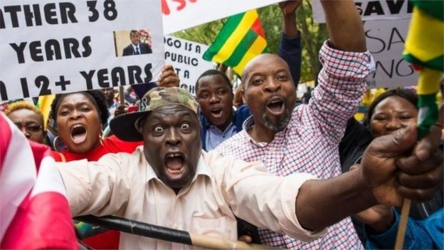 Abdou Razak (C) of Togo demonstrates with others against President Faure GnassingbÃ© in Dag Hammarskjold Plaza outside the UN in New York on September19, 2017
