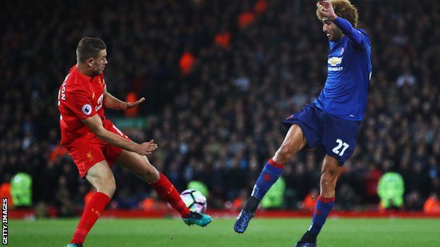 Jordan Henderson na Marouane Fellaini