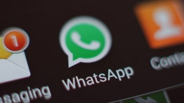 The WhatsApp icon on the screen of a smartphone (27 March 2017)