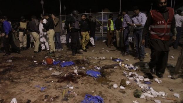 Officials inspect the scene of the attack in Lahore