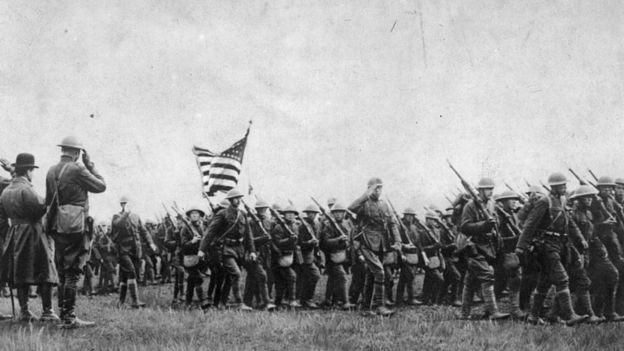 circa 1917: American troops on the march during the First World War.