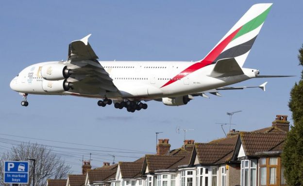Airbus A380 low over residential housing