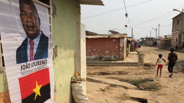 A poster of defence minister Joao Lourenco