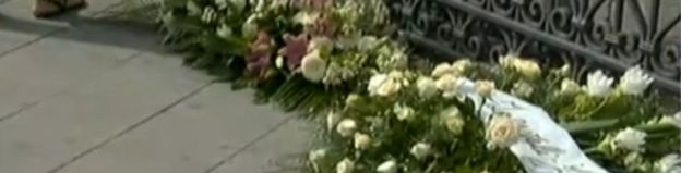 Flowers in front of church where Tiziana's funeral is held, 15 September 2016