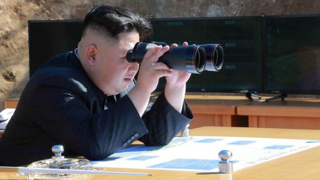 North Korean Leader Kim Jong Un looks on during the test-fire of inter-continental ballistic missile Hwasong-14 in this undated photo released by North Korea's Korean Central News Agency