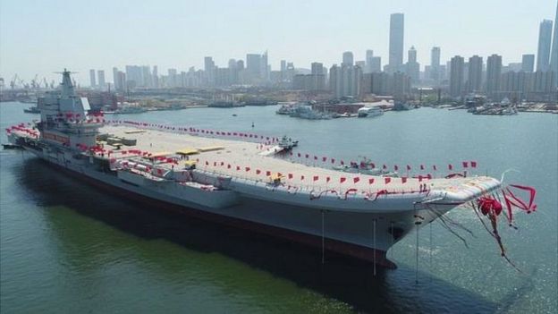 中国媒体引述中国专家的话说，中国至少需要六个航母战斗群，并须为其在海外建设海军基地。