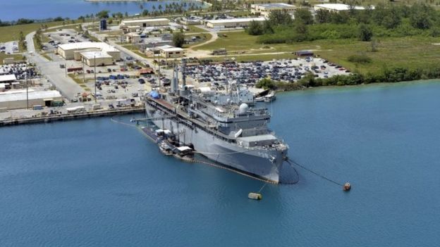 This image obtained from the US Department of Defense shows the submarine tender USS Emory S. Land and the Los Angeles-class attack submarine USS Topeka pierside in their home port at Polaris Point, Guam, on April 19, 2017.