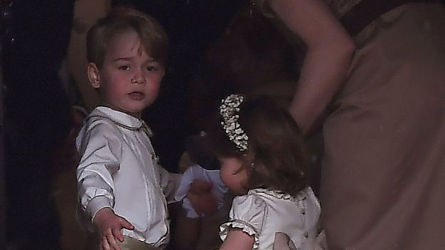 Prince George, a page boy and princess Charlotte, a bridesmaid.