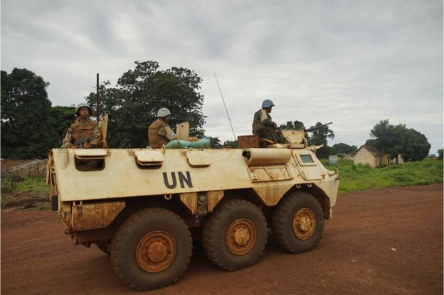 UN peacekeepers on patrol in an armoured tank