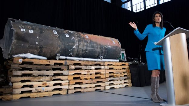 US permanent representative to the UN Nikki Haley gestures towards the remnants of a ballistic missile fired at Riyadh in November