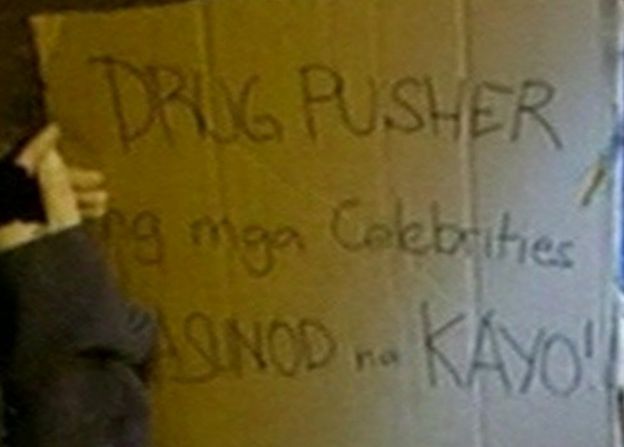 Cardboard sign reading 