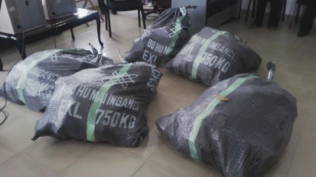 Five black bags supposedly containing the seized cash