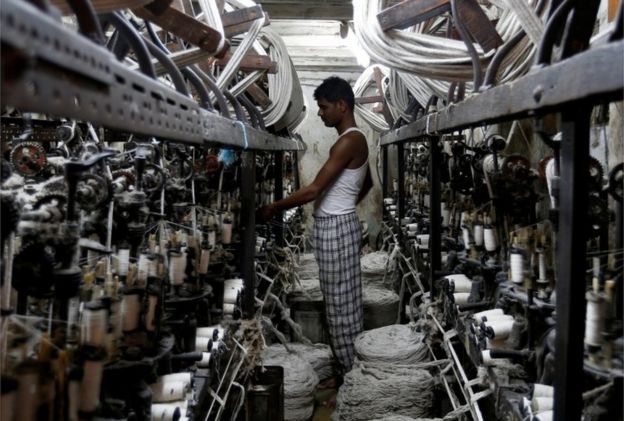 An employee works inside a garment factory in Mumbai, India February 28, 2017