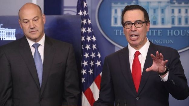 Secretary of the Treasury Steven Mnuchin (R) and National Economic Director Gary Cohn speak about President Donald Trump