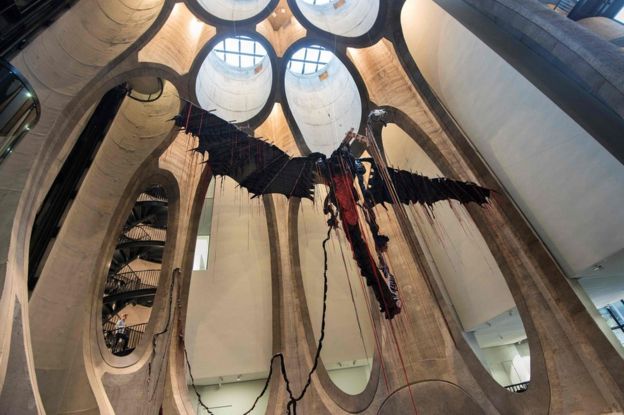 This file photo taken on September 15, 2017 shows a sculpture by South African artist Nicholas Hlobo dominating the main hall in The Zeitz Museum of Contemporary African Art in Cape Town.