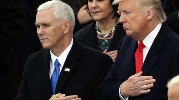 US Vice-President Mike Pence and President Donald Trump during the US national anthem