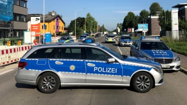 Police block the street leading to the night club
