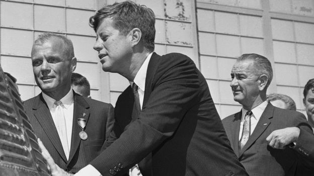 John Glenn (L) President John F Kennedy (M) and Vice-President Lyndon Johnson ® inspect the Friendship 7 capsule