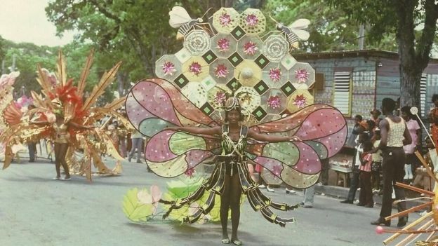 An elaborate bee-themed costume on parade in 1975